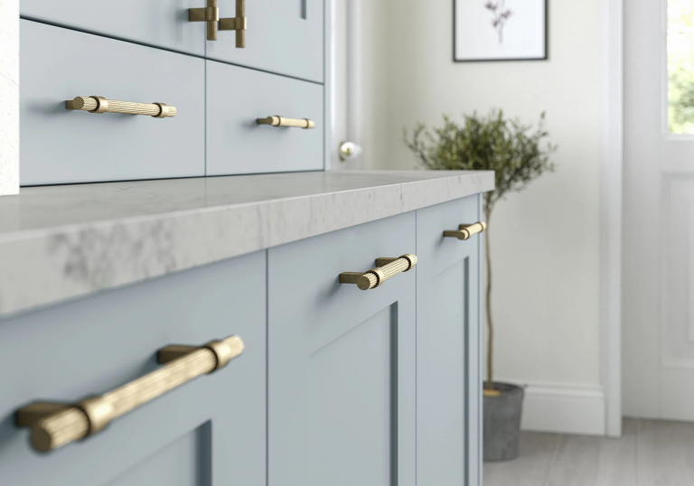 Fluted Antique Brass Bar Handle Shown Here On A Georgia Pantry Blue Dresser
