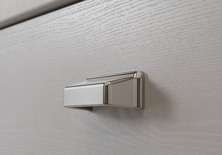 Angular Bright Nickel Cup Handle Shown Against Kensington Light Grey